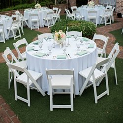 Aces High Party Rentals - Resin Folding Wedding Chairs white and round tables set up