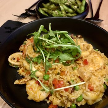 Yunta Nikkei - Arroz con Mariscos (Peruvian Paella) - Jasmine Rice, Octopus, Shrimp, Scallops, Squid, Aji Panca, Miso, Parmesan Cheese - Peruvian Near Me - Charlotte, North Carolina Yunta Nikkei - Arroz con Mariscos (Peruvian Paella) - Jasmine Rice, Octopus, Shrimp, Scallops, Squid, Aji Panca, Miso, Parmesan Cheese - Peruvian Near Me - Charlotte, North Carolina