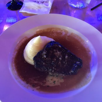 Firefly Grill - NY strip with herb butter, whipped potatoes and demi glacé - Steakhouses Near Me - Effingham, Illinois Firefly Grill - NY strip with herb butter, whipped potatoes and demi glacé - Steakhouses Near Me - Effingham, Illinois