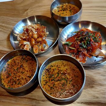 San Ho Won - Ban chan. Chilled tofu with sauce, kimchi, and dried squid with roasted peanuts. - Korean Near Me - San Francisco, California San Ho Won - Ban chan. Chilled tofu with sauce, kimchi, and dried squid with roasted peanuts. - Korean Near Me - San Francisco, California