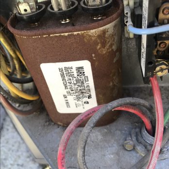 Elite Climate Control - This capacitor kept hitting that blue wire to right which caused the short. - Heating & Air Conditioning/HVAC Near Me - Apple Valley, California Elite Climate Control - This capacitor kept hitting that blue wire to right which caused the short. - Heating & Air Conditioning/HVAC Near Me - Apple Valley, California