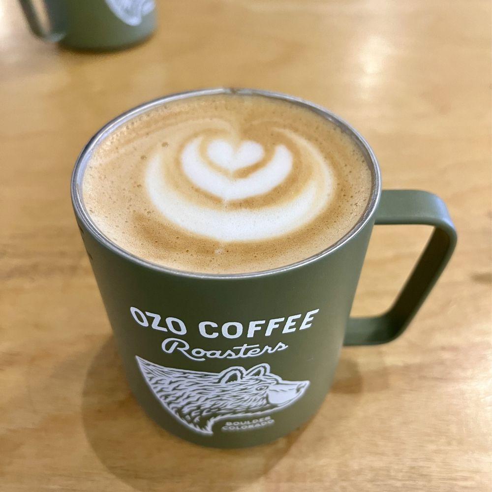 Latte with honey lavender syrup and oat milk. Latte with honey lavender syrup and oat milk.