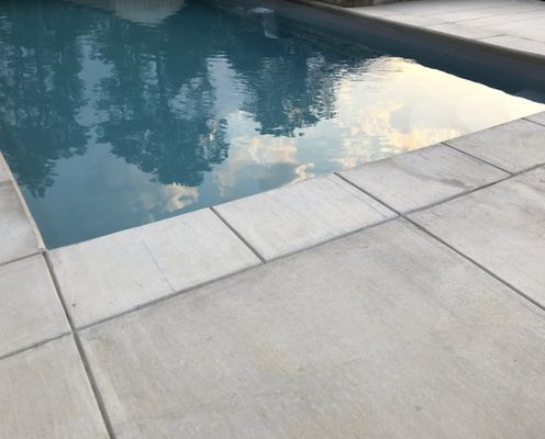 Swimming Pools - For the past 20+ years, we have been offering exceptional services to Fayetteville and the surrounding communities. We specialize in delivering quality concrete solutions and swimming pool projects. With our commitment to excellence and a team of experienced professionals, we strive to provide our clients with customized solutions that enhance their outdoor living spaces. Contact us today for a free estimate and let us create a stunning concrete masterpiece or build your dream swimming pool, ensuring complete satisfaction with every detail. Swimming Pools - For the past 20+ years, we have been offering exceptional services to Fayetteville and the surrounding communities. We specialize in delivering quality concrete solutions and swimming pool projects. With our commitment to excellence and a team of experienced professionals, we strive to provide our clients with customized solutions that enhance their outdoor living spaces. Contact us today for a free estimate and let us create a stunning concrete masterpiece or build your dream swimming pool, ensuring complete satisfaction with every detail.
