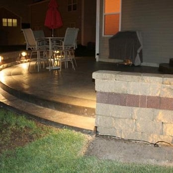 Hogan Concrete - stamped concrete patio with lighted retaining wall - Masonry/Concrete Near Me