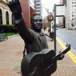 Huddie William "Lead Belly" Ledbetter Statue - Huddie huddled with 12-stringed Stella ready to strum us through winter storms ahead! Great blues weather! 1/3/15!