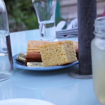 Chester Common Table - a plate of cake and a glass of water - Comfort Food Near Me - Chester, Massachusetts