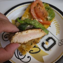 Raw chicken from the Cali Chicken Sandwich Raw chicken from the Cali Chicken Sandwich