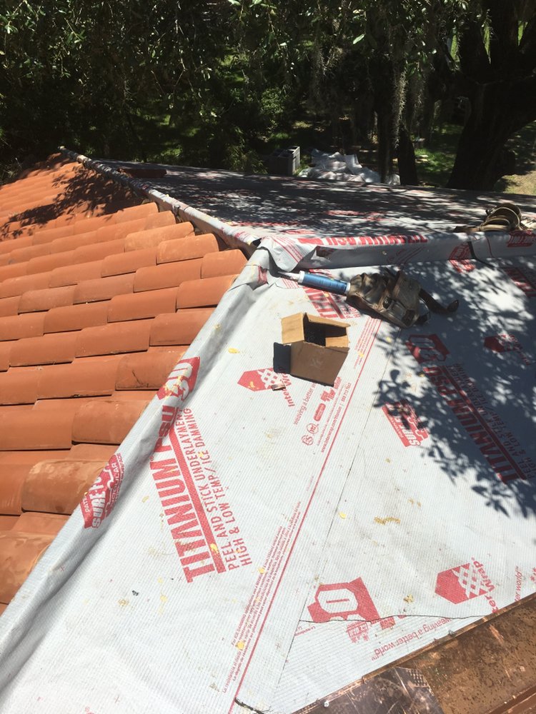 Slide of Don Juan Roofing and Painting