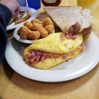 D'egg West - The other half's ham and cheese omelet with tator tots, toast and his extra side of French toast lol - Diners Near Me - Norfolk, Virginia
