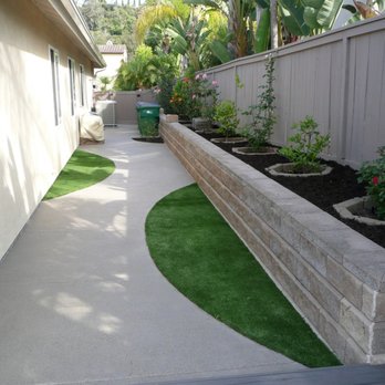 Rivers Landscape Construction - Side yard with new concrete and Asto-turf. - Masonry/Concrete Near Me - Escondido, California