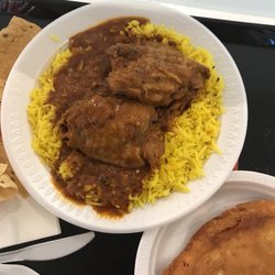 A Taste of India Foods - Curry chicken and lemon rice. $4.35 5.19.2018