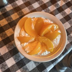 The Outpost Grill - Cottage cheese with peaches on top