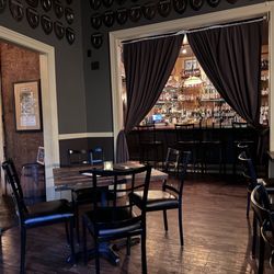 Pope House Bourbon Lounge - Secluded dining room with view to the bar