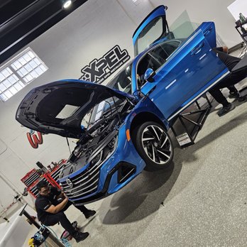 AB Wraps - AB Wraps Miami installing XPEL Ultimate Fusion paint protection film all over the vehicle. - Vehicle Wraps Near Me - Miami, Florida