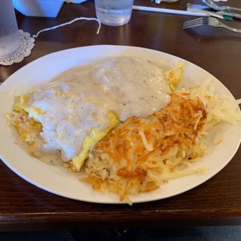 Eggsellent Cafe - Biscuit and gravy omelette with hash browns. - Breakfast & Brunch Near Me - Carrollton, Texas