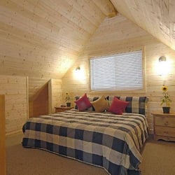 Green Acres Lakeside Cottage Resort - Loft Bedroom in one of the Chalets