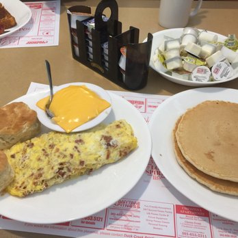 Smyrna Diner - Slice of processed cheese on top of the grits....interesting. - Diners Near Me - Smyrna, Delaware Smyrna Diner - Slice of processed cheese on top of the grits....interesting. - Diners Near Me - Smyrna, Delaware