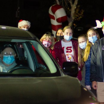 Creative Inflatables - Our team of volunteers with the Creatable Inflatable candy cane in the background. - Party Equipment Rentals Near Me - South El Monte, California