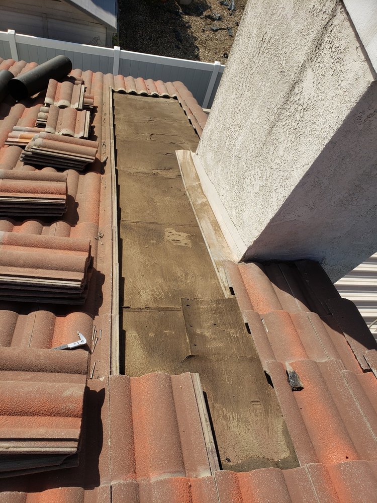 Slide of Art Roofing Plus