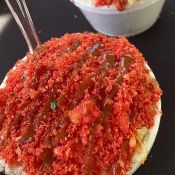 Elote Fuego - a close up of a red cake - Mexican Near Me Elote Fuego - a close up of a red cake - Mexican Near Me