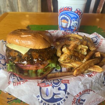 Eskimo Joe's - Fire Burger Topped with Pepper-Jack cheese, jalapeño peppers and spicy hot buffalo wing sauce - American Near Me - Stillwater, Oklahoma