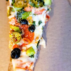 Pizza Bella - I hardly see ANY sauce, let alone the extra sauce I ordered!