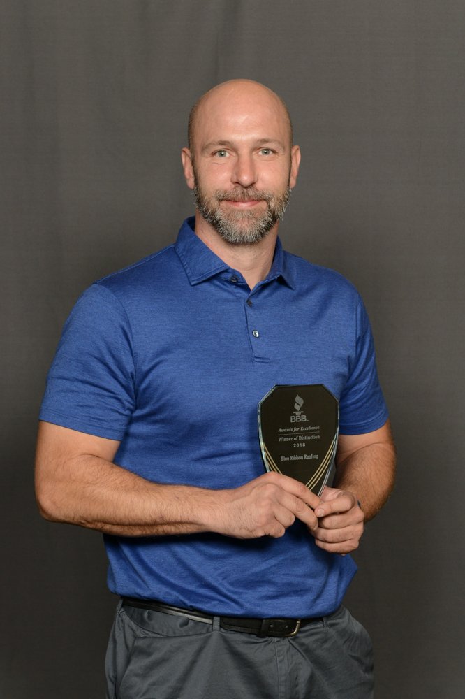 Slide of Blue Ribbon Roofing