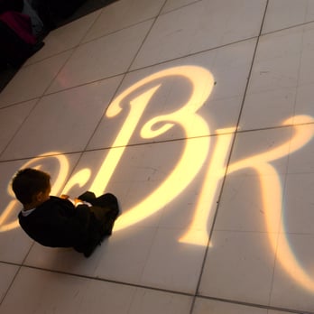 Main Event Productions - The ring bearer examining our Monogram Lighting - DJs Near Me