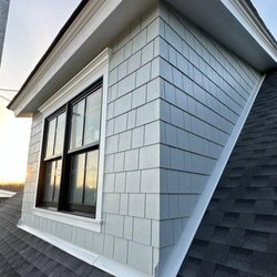 Style Exteriors by Corley - Dormer with cedar shake siding.