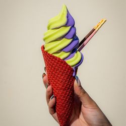 Devil & Angel Desserts - Pistachio + ube soft serve swirl with a waffle cone! IG: eat.w.alyssa