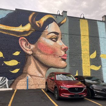 Rhein Haus - Very cool sode of building mural - Bars Near Me - Denver, Colorado Rhein Haus - Very cool sode of building mural - Bars Near Me - Denver, Colorado