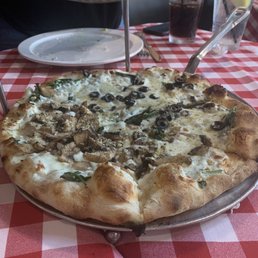 Half mushroom and garlic, half olives and garlic Half mushroom and garlic, half olives and garlic