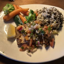 Bâton Rouge Steakhouse & Bar - Atlantic salmon with rice pilaf and vegetables