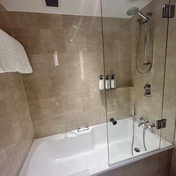 Four Seasons Hotel Sydney - Shower with liquid soap, shampoo, and conditioner - Hotels Near Me - Sydney, NSW Four Seasons Hotel Sydney - Shower with liquid soap, shampoo, and conditioner - Hotels Near Me - Sydney, NSW