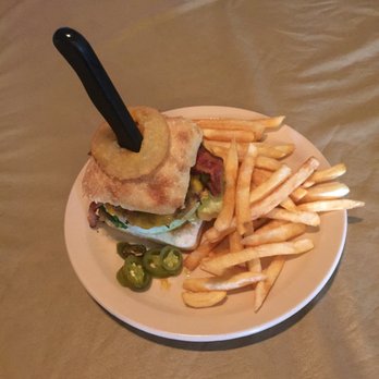 Longhorn Saloon - a sandwich and fries on a plate - Bars Near Me - Bonanza, Oregon Longhorn Saloon - a sandwich and fries on a plate - Bars Near Me - Bonanza, Oregon