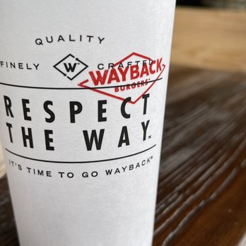 Wayback Burgers - a cup of coffee on a table - Burgers Near Me - Darien, Illinois