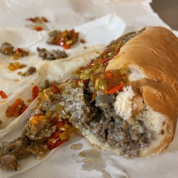 Lefty's Famous Cheesesteaks - a half eaten sandwich - Cheesesteaks Near Me - Belleville, Michigan Lefty's Famous Cheesesteaks - a half eaten sandwich - Cheesesteaks Near Me - Belleville, Michigan