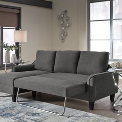 Chicago Best Furniture - Description:	Small space living is easier than ever with the Jarreau queen sofa sleeper. W soft cushions and oversized pillow backs are su