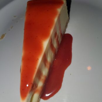 Pirates Dinner Adventure - Cheesecake covered in strawberry sauce - Performing Arts Near Me - Orlando, Florida Pirates Dinner Adventure - Cheesecake covered in strawberry sauce - Performing Arts Near Me - Orlando, Florida