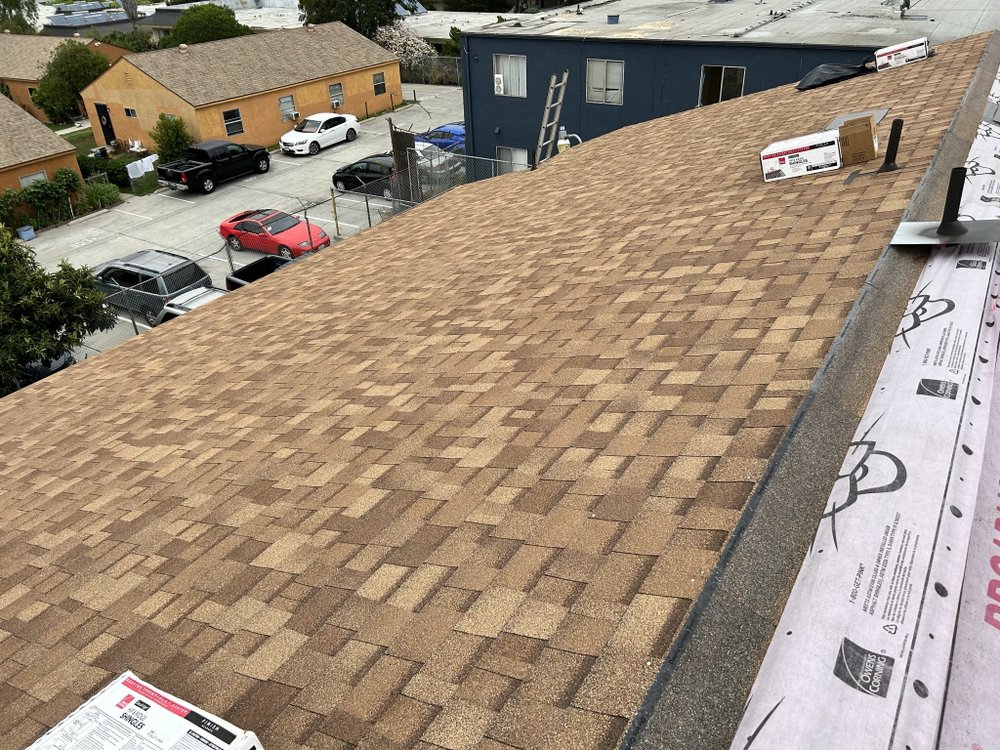 Slide of Mo's Professional Roofing