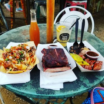 Truck Yard - Bottled old fadhioned on top left and Gin & Juice cocktail on top right. The food is from the Not Just Q food truck. - Food Stands Near Me - Dallas, Texas Truck Yard - Bottled old fadhioned on top left and Gin & Juice cocktail on top right. The food is from the Not Just Q food truck. - Food Stands Near Me - Dallas, Texas