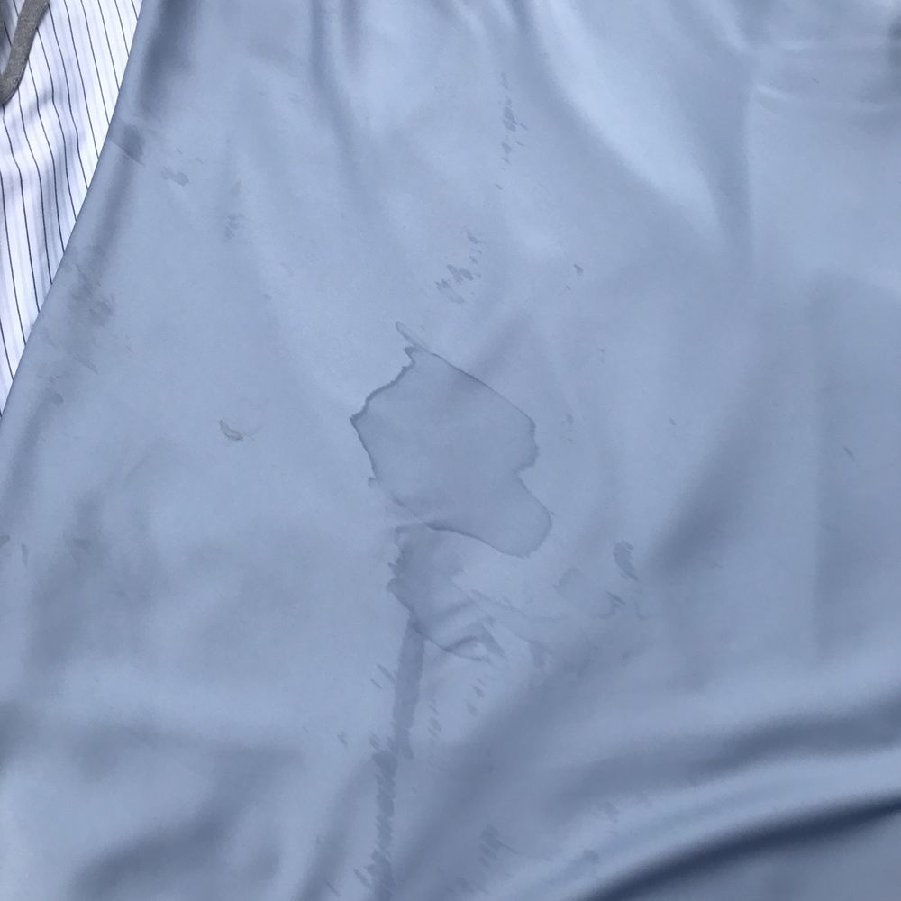 Comet Cleaners - Champagne stain pressed into silk skirt - Laundry Services Near Me - Hudson Oaks, Texas Comet Cleaners - Champagne stain pressed into silk skirt - Laundry Services Near Me - Hudson Oaks, Texas