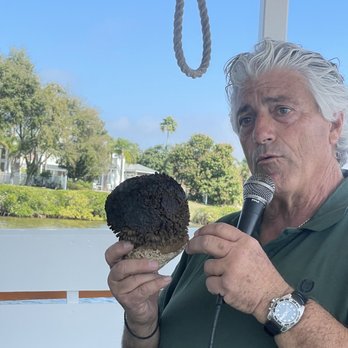 St. Nicholas Boat Line - The captain holding a sponge and explaining the different types.  He was great with people and did a great job!! - Tours Near Me - Tarpon Springs, Florida