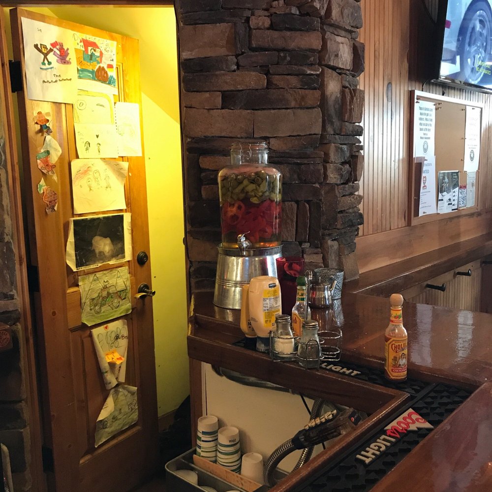 Mango's Mountain Grill - That decanter is filled with infused vodka, so good - Bars Near Me - Red Cliff, Colorado