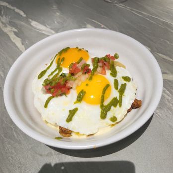 Azucar Cuban Restaurant - Loaded Potatoes with Over-Easy Eggs Brunch - Cuban Near Me - Huntersville, North Carolina Azucar Cuban Restaurant - Loaded Potatoes with Over-Easy Eggs Brunch - Cuban Near Me - Huntersville, North Carolina