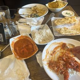 Butter chicken, garlic Nan, and chicken biryani Butter chicken, garlic Nan, and chicken biryani