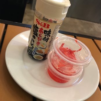 Nami Ramen - Finger and seasoned pepper on the table - Ramen Near Me - Saint Louis, Missouri