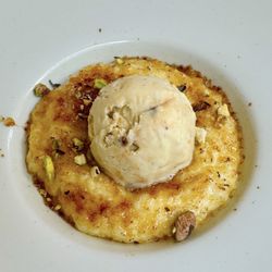 The Lamb At Angmering - Caramelised vanilla rice pudding, roasted pistachios, white chocolate & pistachio ice cream