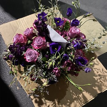Dolce Blooms - It's obviously in a box to kept it sturdy while driving, but it had a beautiful golden vase. - Florists Near Me - Los Angeles, California