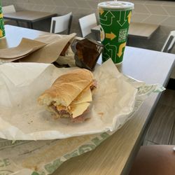 Subway - 6 inch white bread san which: ham & american cheese. w bbq chips & sweet tea.